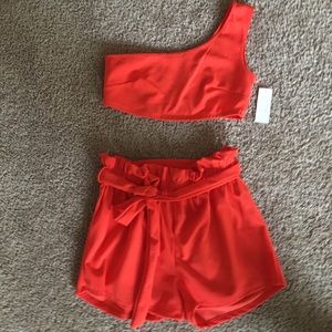 Two-Piece Orange Set with the tags still attached